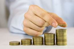 Coins being counted by hand
